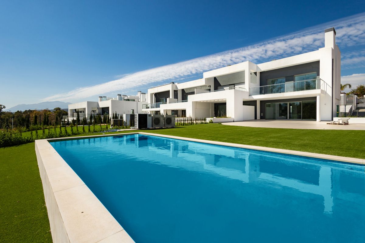 The community pool and the row of townhouses