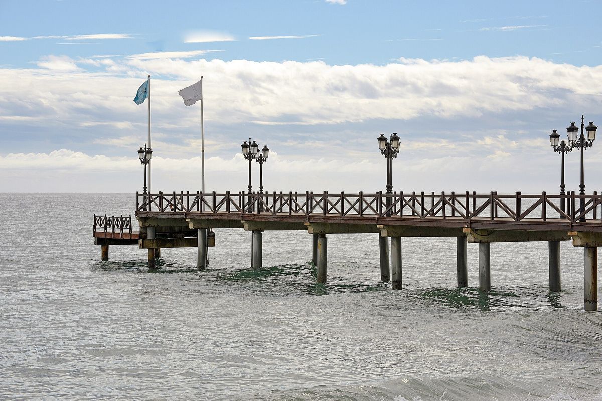 The wooden pier off the Golden Mile beach