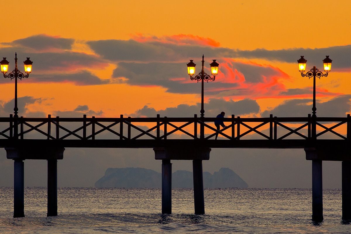 Lamps on the pier at dusk