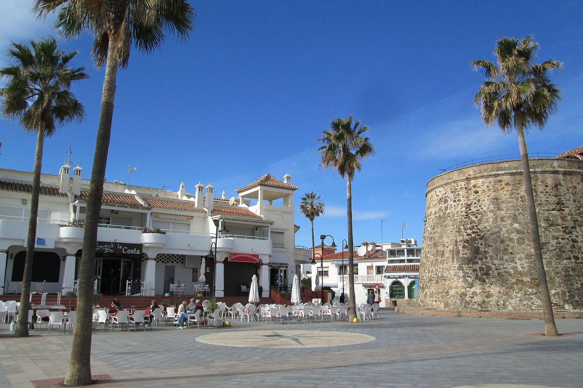 Cafés on the square beside the Torreón