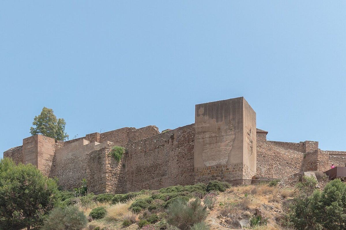 The walls of the Alcazaba climbing the hill