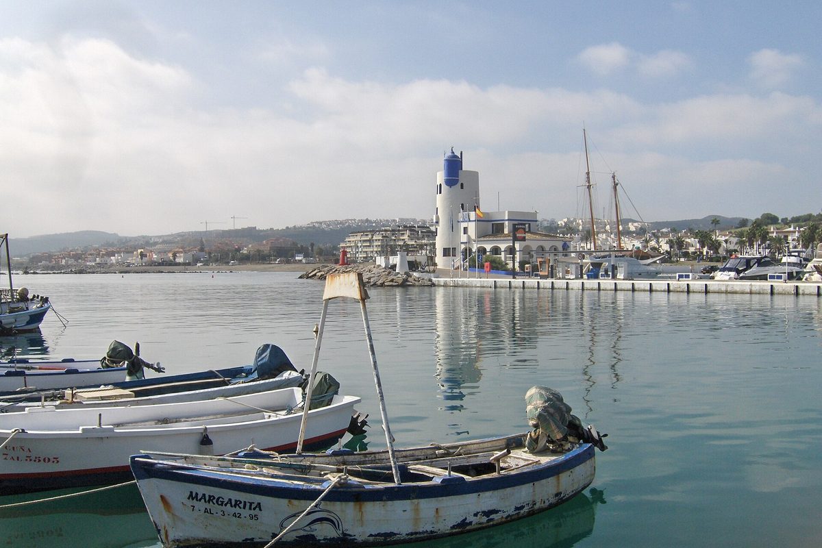 The harbour lighthouse and fishing boats