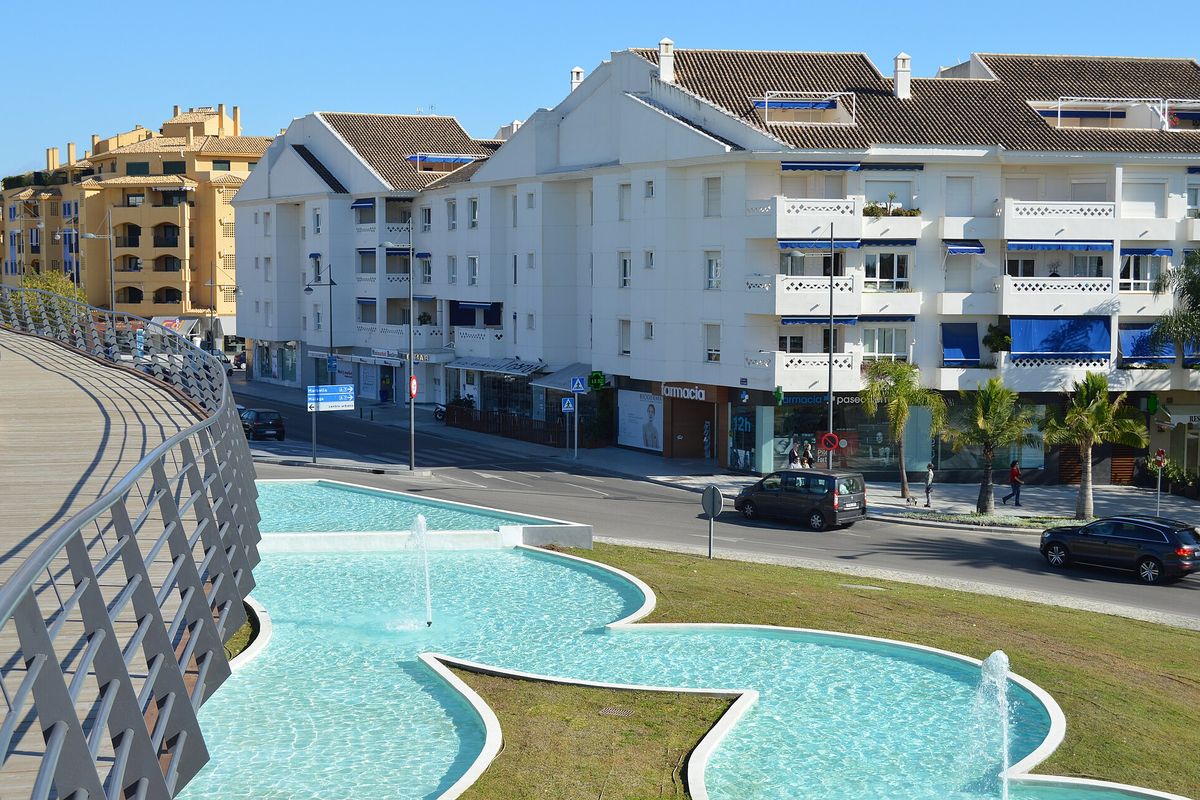 Fountains on the bulevar and the flats of the town centre