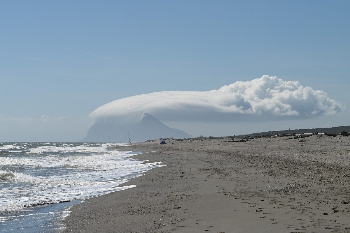 The Rock of Gibraltar under its cloud, from the beach south of Sotogrande