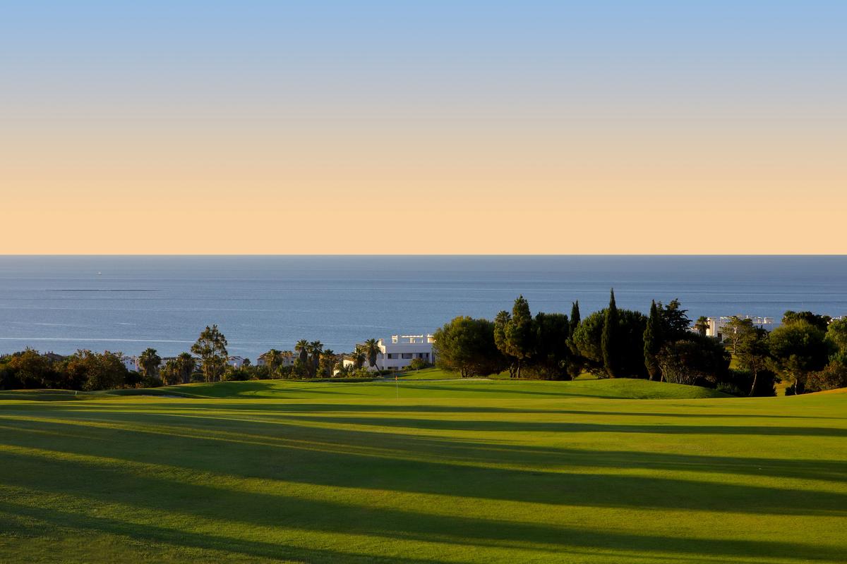 Fairway at sunset looking out to sea